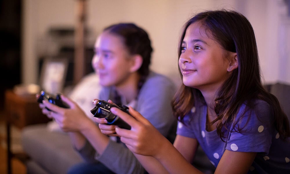 Man and woman playing videogames